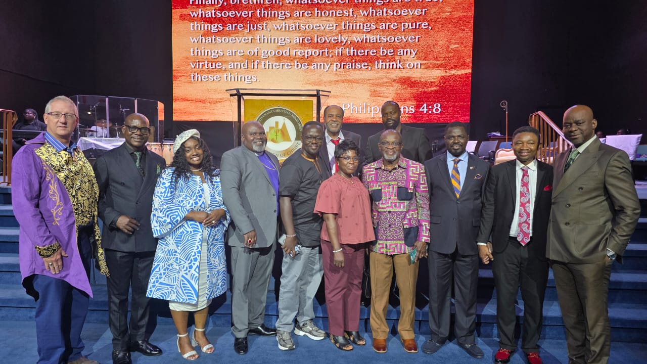 Leaders gathered after an international ministry partnership
